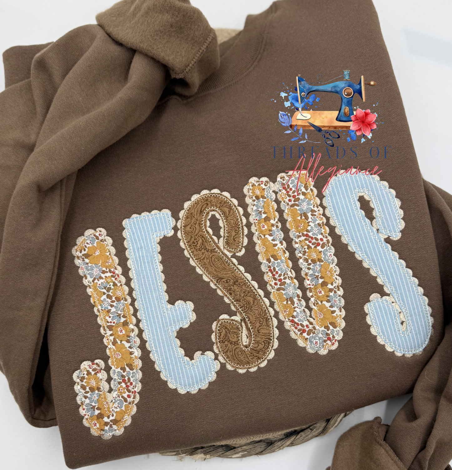 “Jesus” appliqué sweatshirt with scallop detail