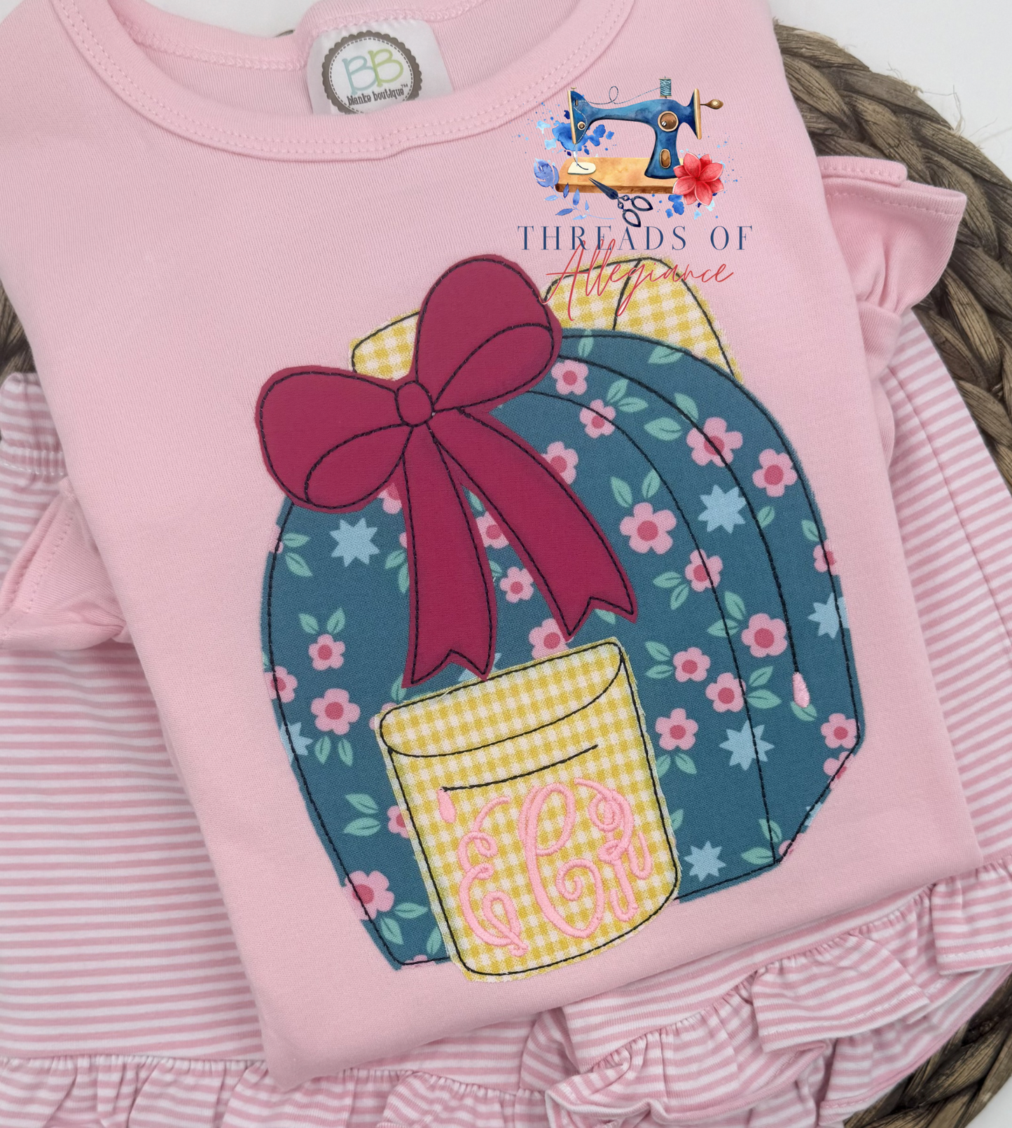 Floral monogram backpack